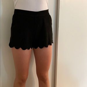 Faux suede scalloped black shorts